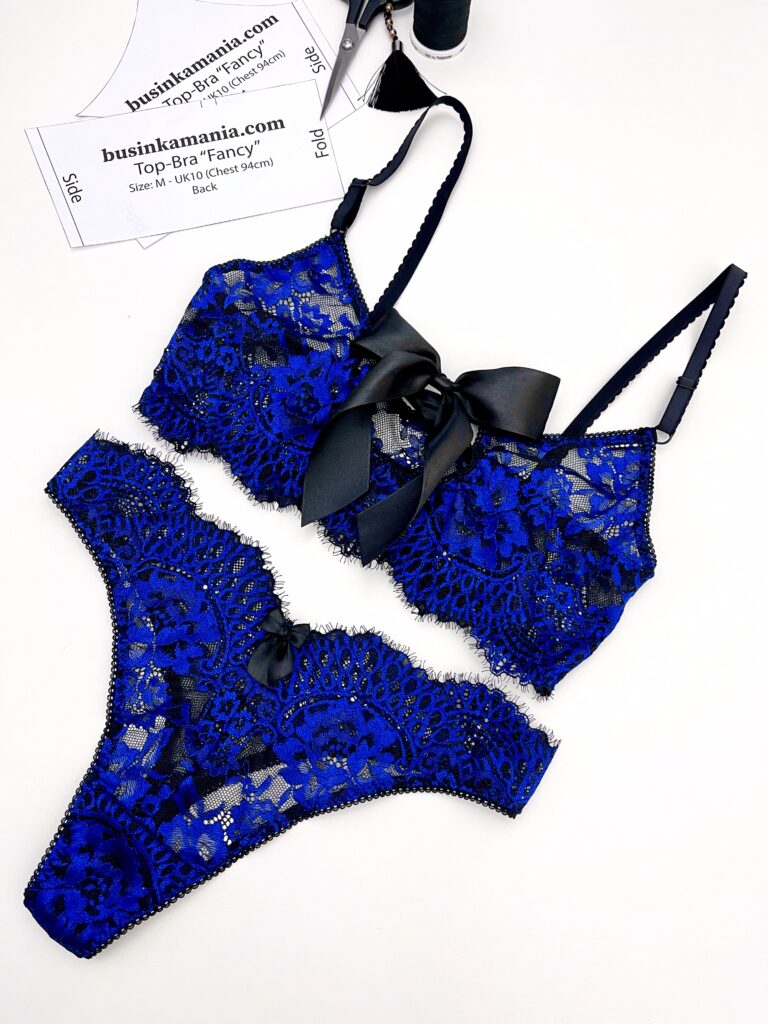 Handmade blue eyelash lace lingerie set featuring a bralette and matching panties with satin bows.