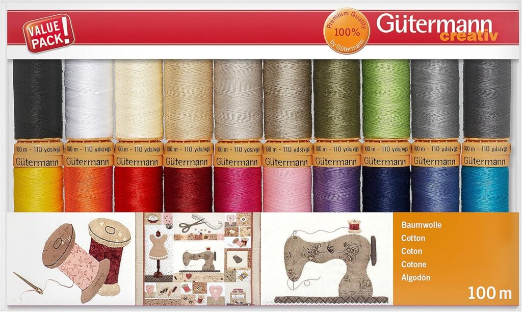 Gutermann Creativ cotton thread pack in various colours, each spool labelled, with sewing illustrations at the bottom.