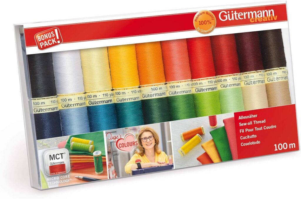 Gutermann Creativ cotton thread pack in various colours, each spool labelled, with sewing illustrations at the bottom.