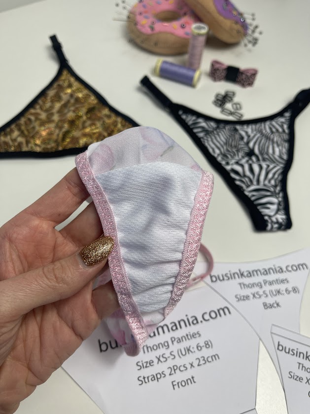 Polyester gusset fabric held in hand, essential lingerie sewing material showing soft breathable lining for handmade underwear comfort