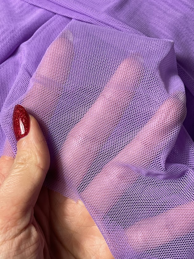 Transparent spandex mesh fabric sample showing breathable texture for underwear and swimwear