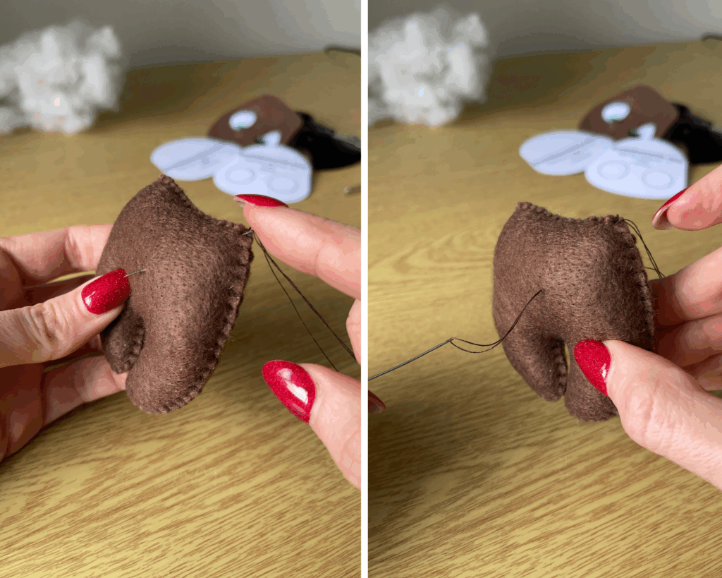 Hands sewing brown felt plush piece, pulling thread through to hide thread end using clean finish sewing technique